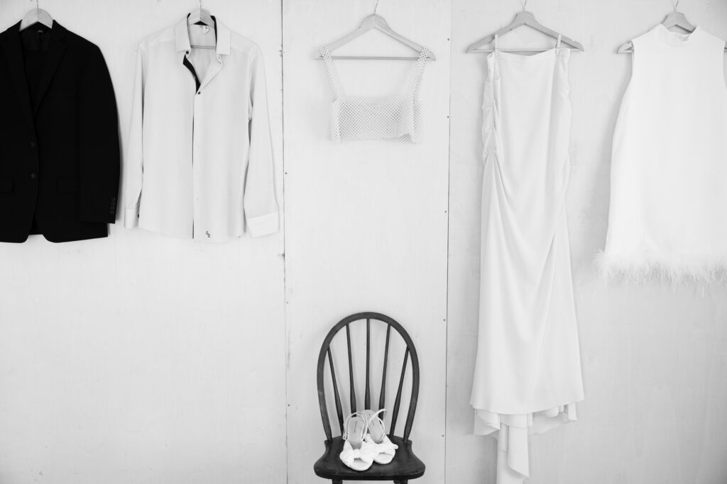 Wedding attire on hangers  in black and white