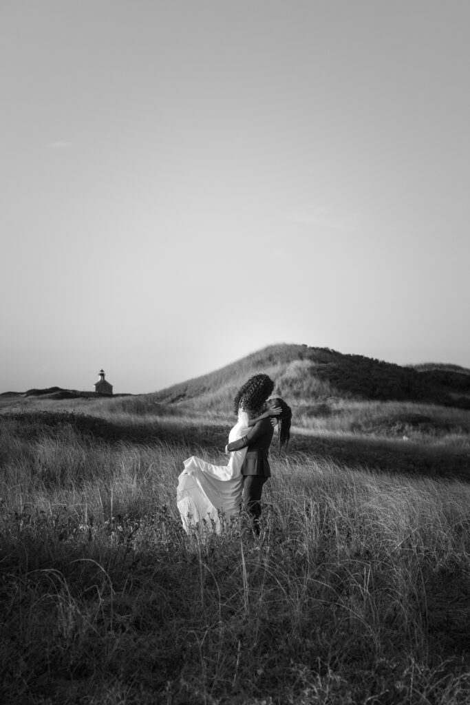 Intimate wedding portraits in the dunes of block island in black and white