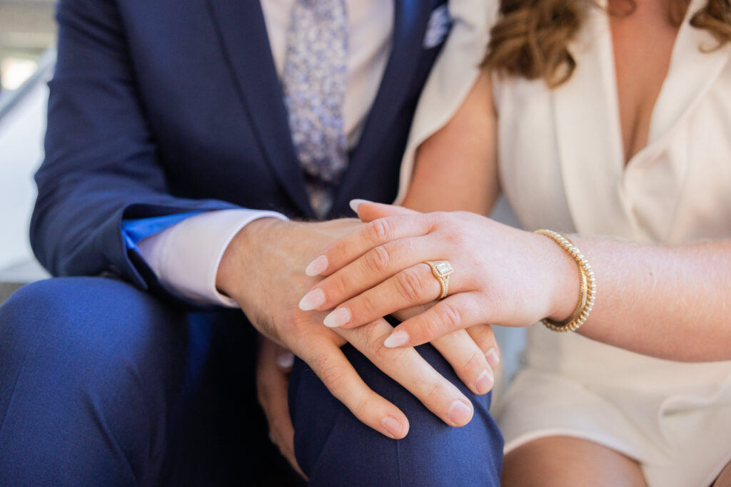 Detail photo of wedding bands for a couple eloping in Quincy City Hall