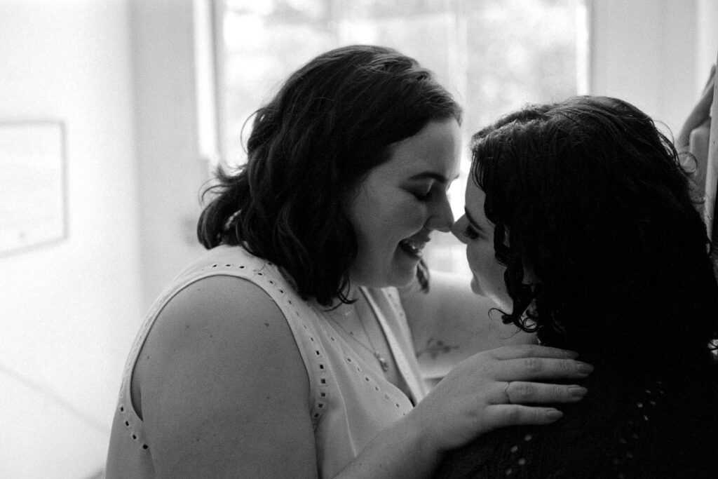 lesbians pose for engagement photos at The Montague Bookmill