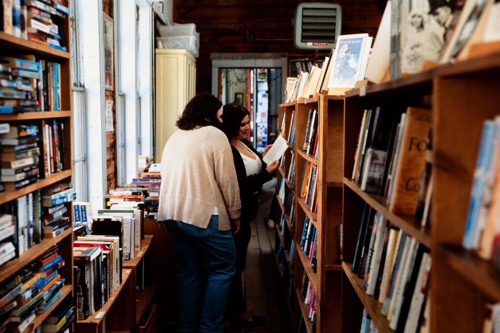 engagement photos in a Montague bookstore