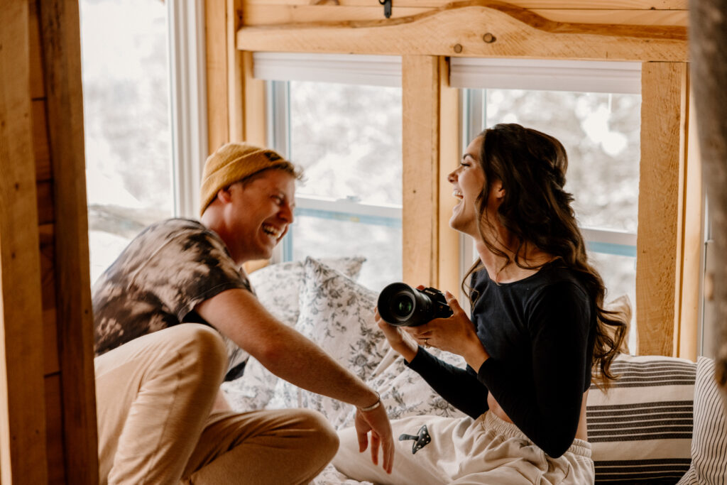 Candid couples session, cozy session in a cabin, Couple photographing each other, engagement photos, Vermont engagement