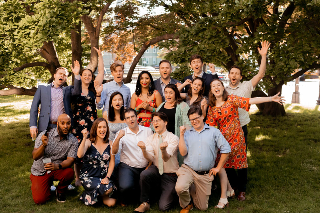 College group photo with the bride and groom at a wedding at the Loring-Greenough House