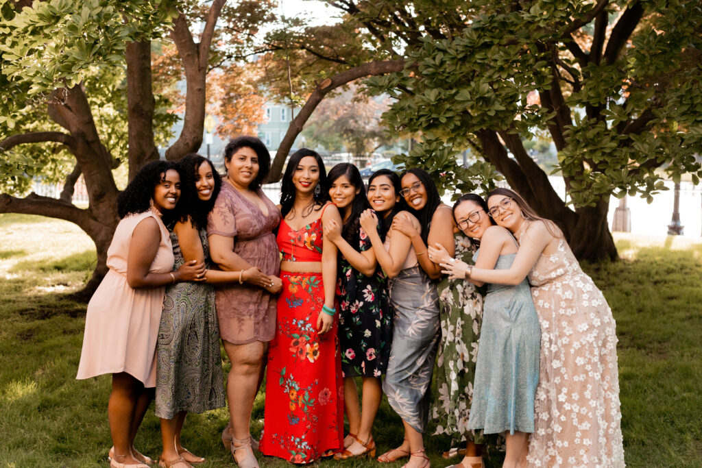 College group photo with the bride and groom at a wedding at the Loring-Greenough House