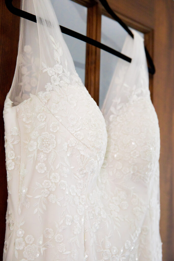 Detail photo of wedding dress, beaded floral lace