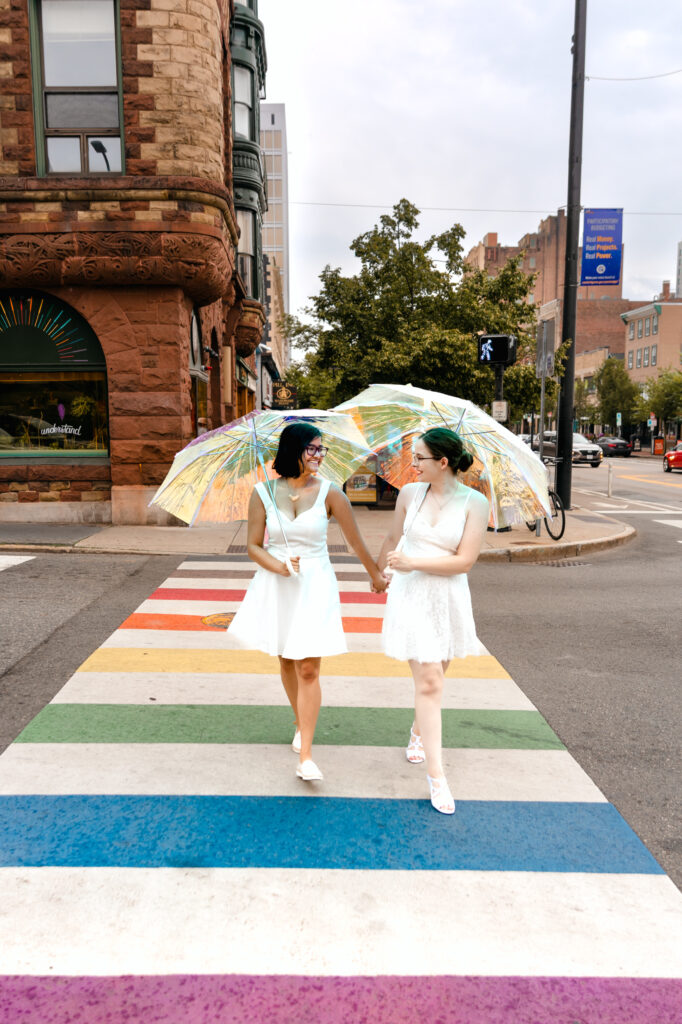 lesbian couple posed for photos outside of Cambridge City Hall wedding 