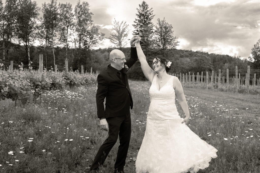 Candid moment of the bride and groom during their couples portraits at their wedding