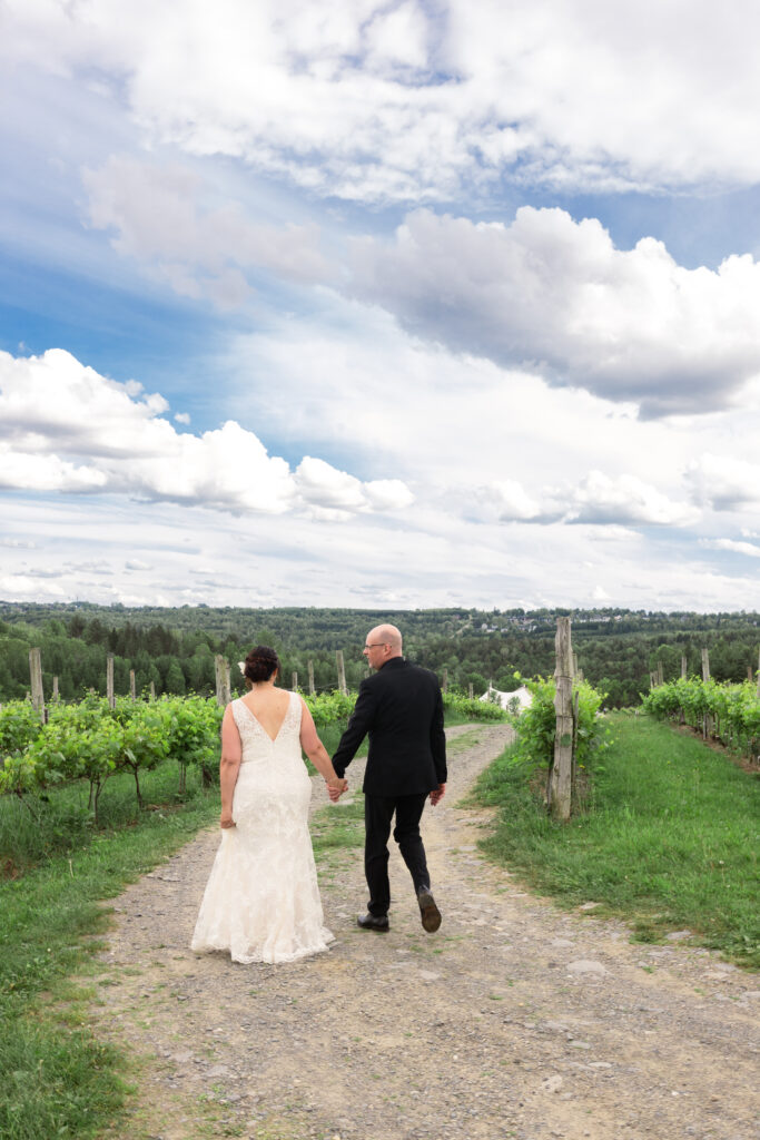 Candid moment of the bride and groom during their couples portraits at their wedding