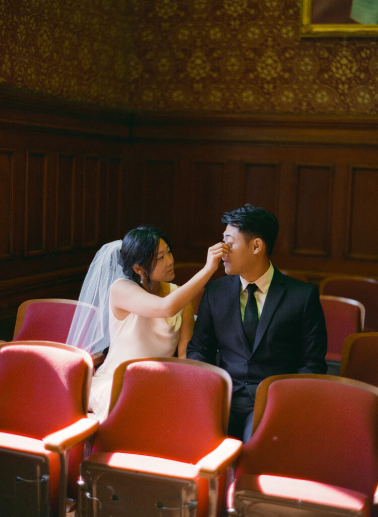 Intimate wedding ceremony at Cambridge City Hall with family present, photographed by a Boston elopement film photographer.