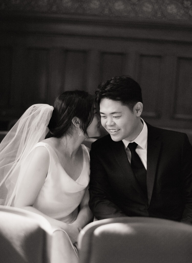 Intimate wedding ceremony at Cambridge City Hall with family present, photographed by a Boston elopement film photographer.