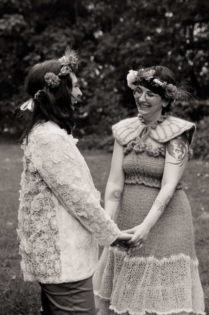 Black and white photograph of a couple caught mid-dance. 