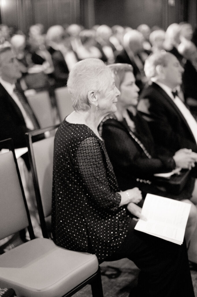 wedding guests watching wedding ceremony