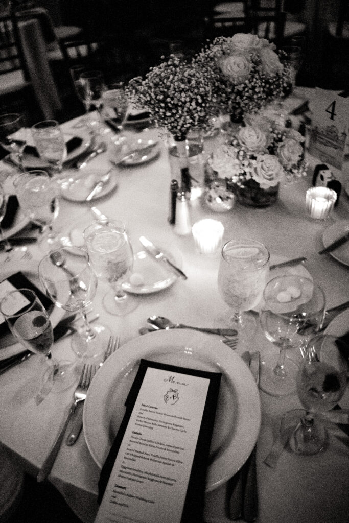 wedding table with place settings in black and white photo