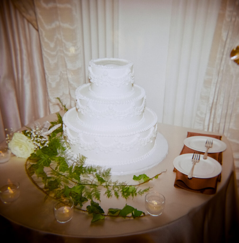 three tier white wedding cake