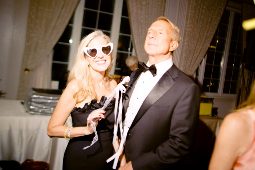 wedding guests smiling and having fun during wedding reception