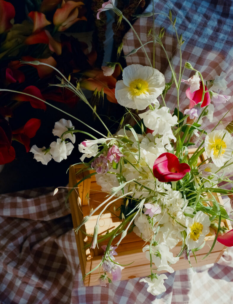 a bouquet of flowers in a basket