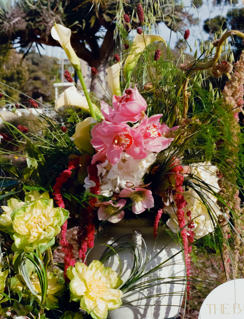pink, green, and yellow flower arrangement 
